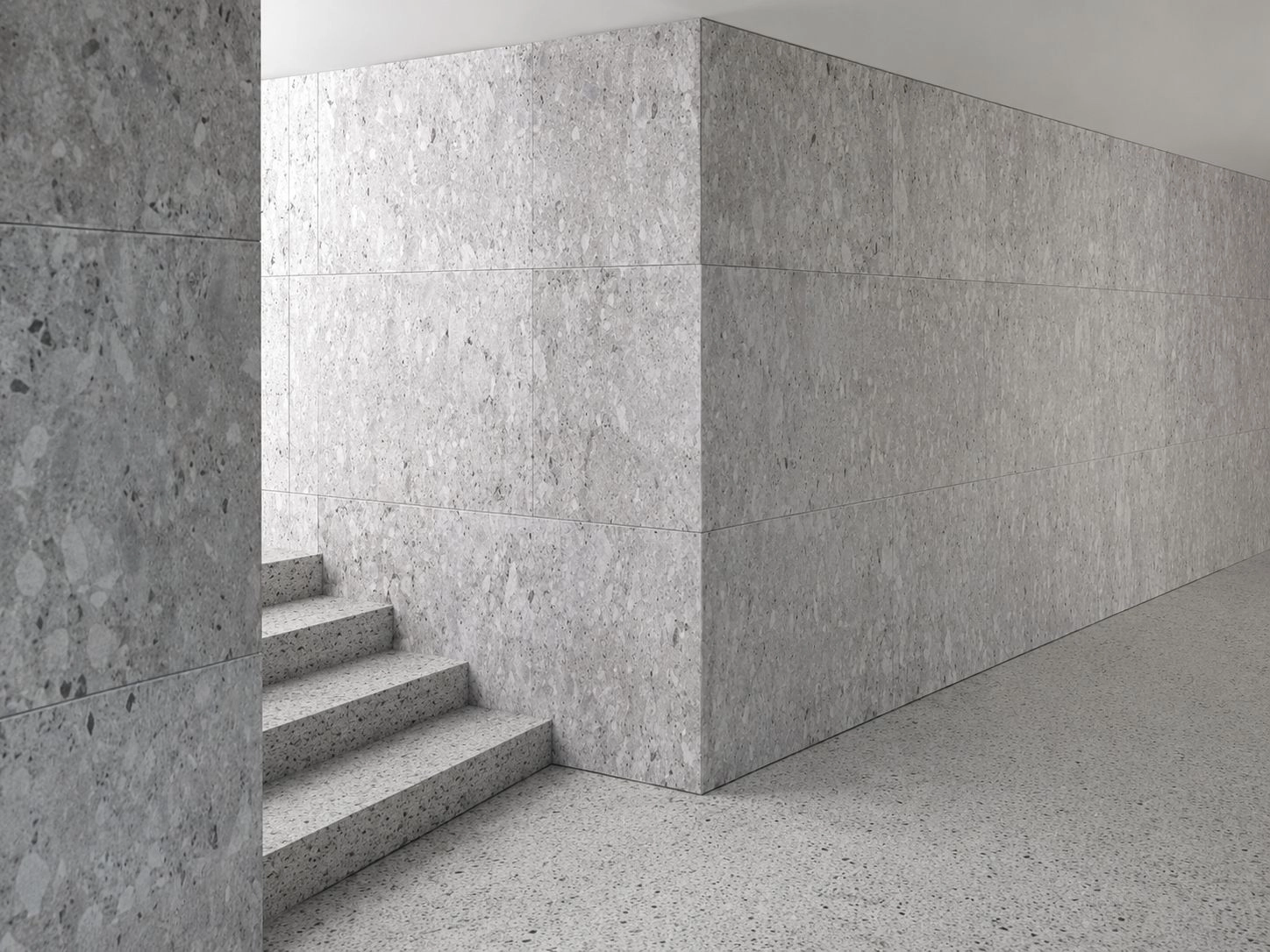 Natural stone feature wall with clean joint alignment by X4 Design and Build